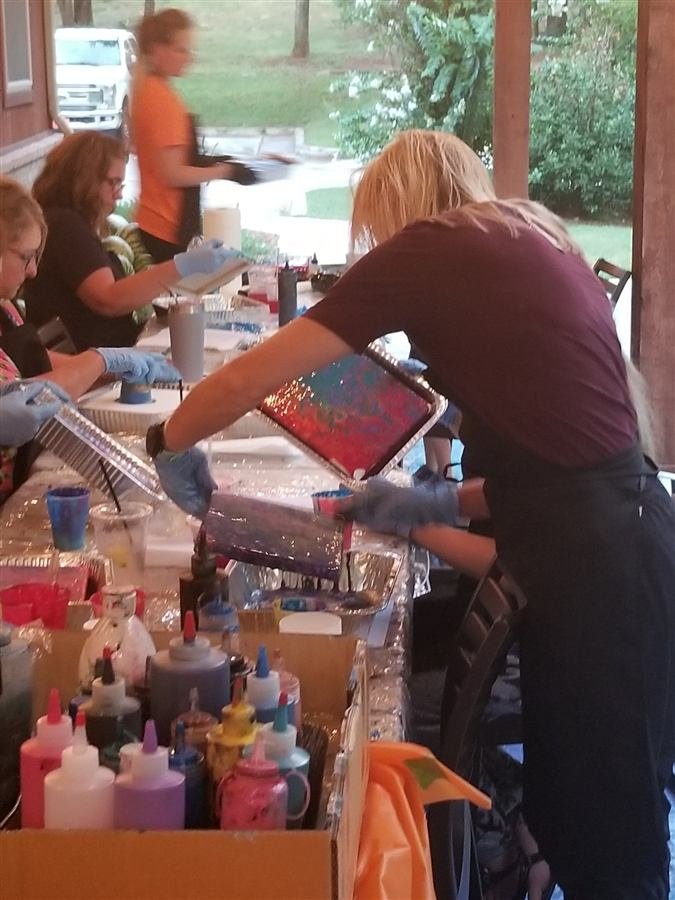 Students painting at one of Wilhelmina's classes