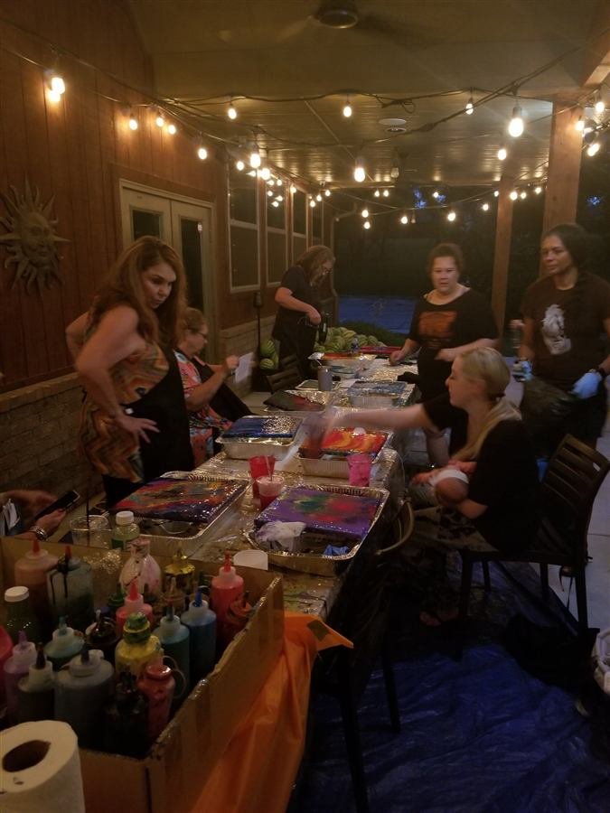Students painting at one of Wilhelmina's classes